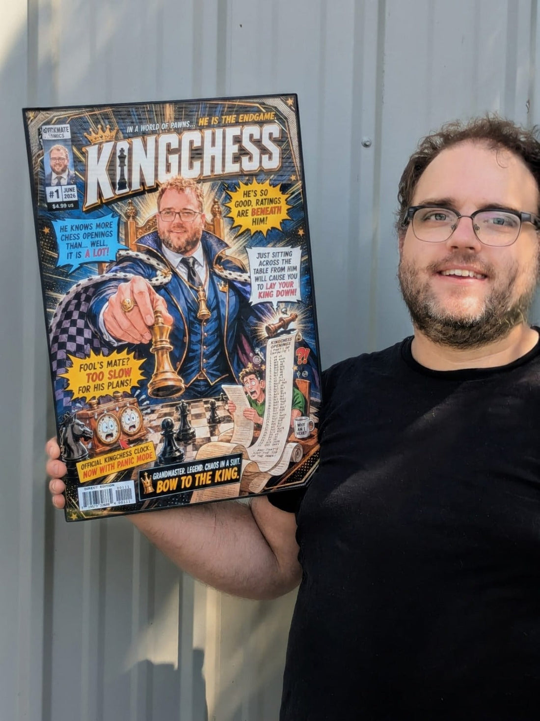 Ryan holding his personalized KingChess framed comic cover